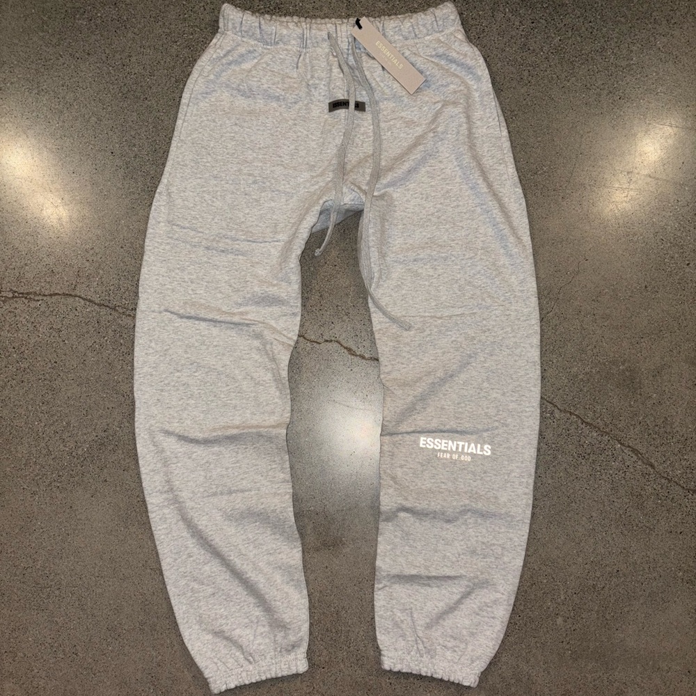 Fear of god essentials sweatpants 
Light oatmeal